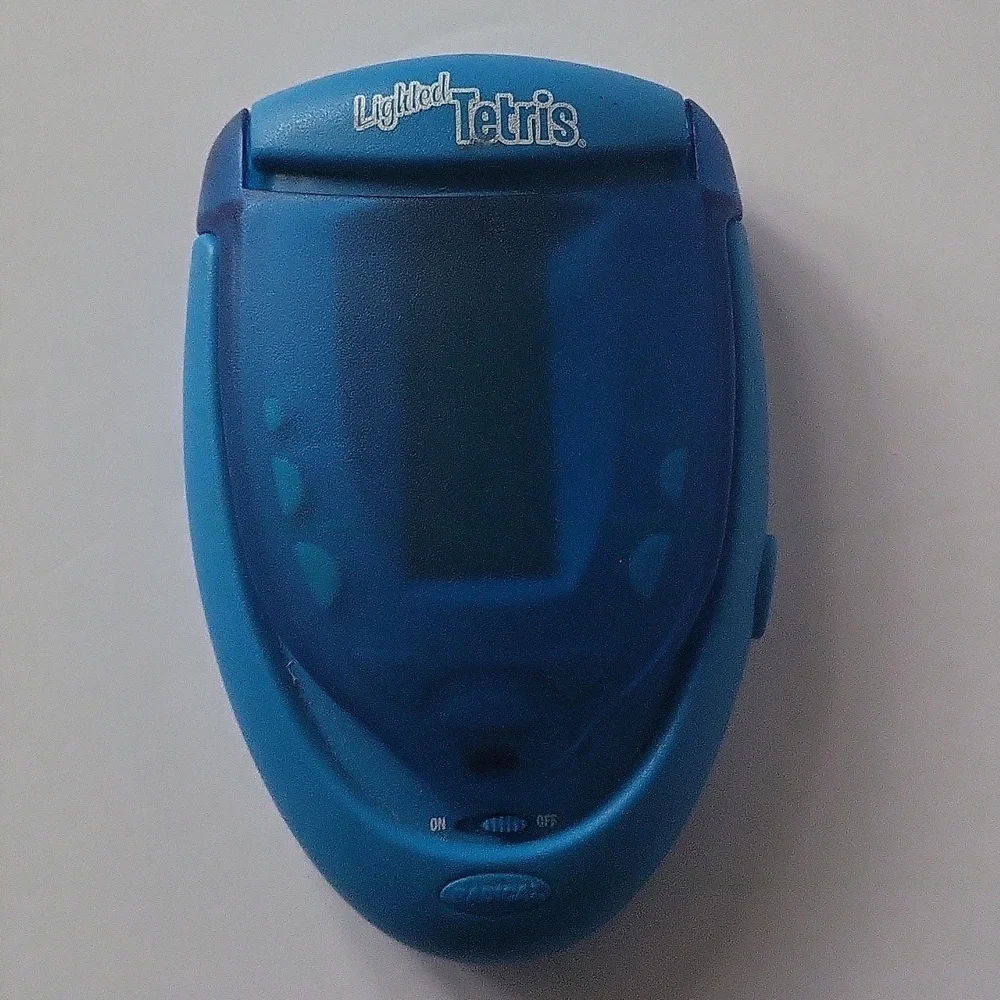 Tetris Lighted Electronic Handheld Travel Game Radica Fliptop Blue 2004 RADICA
